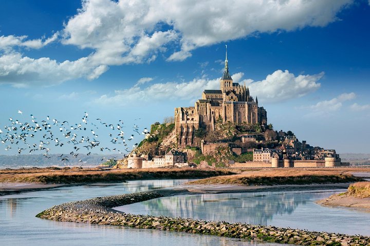 Private 12-hour round transfer to abbey of Mont Saint Michel Normandy from Paris